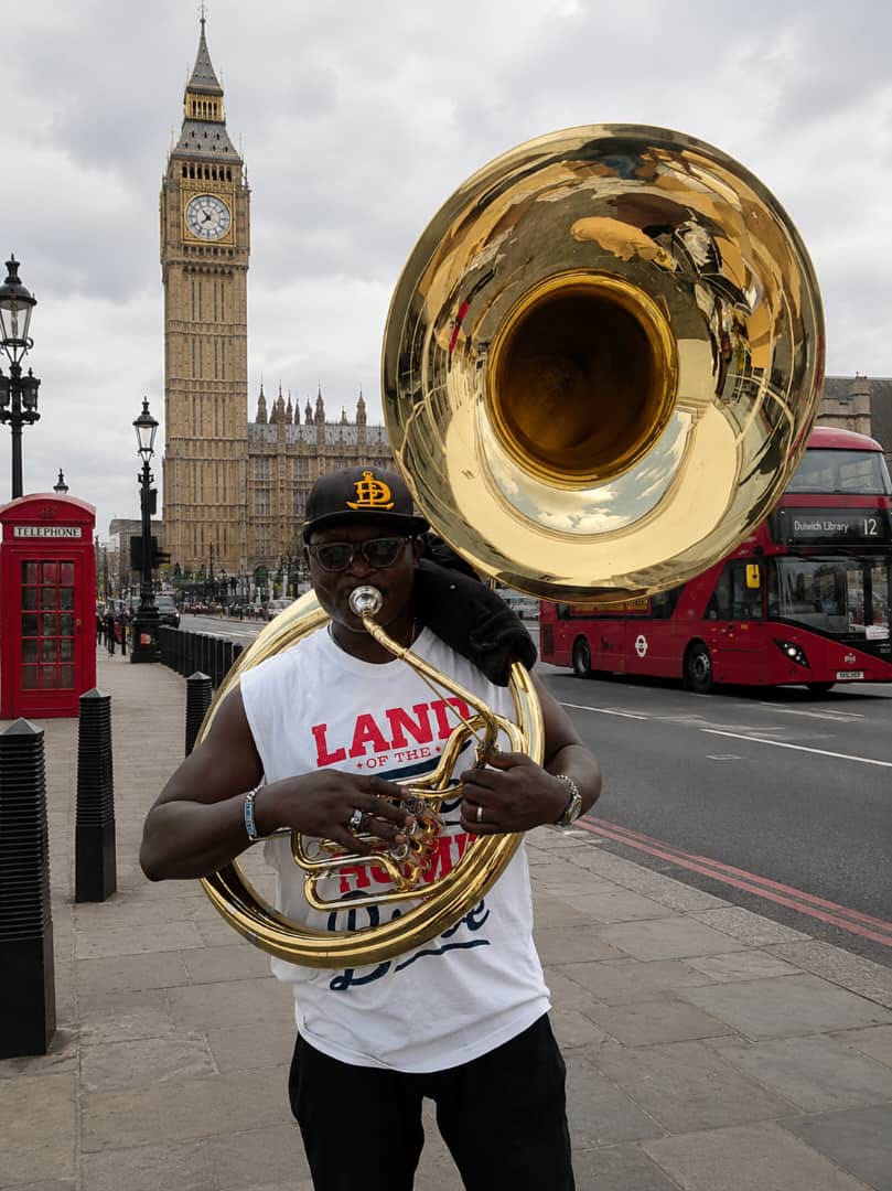 Vanity Funeral Home brass band sousaphone player performing in London