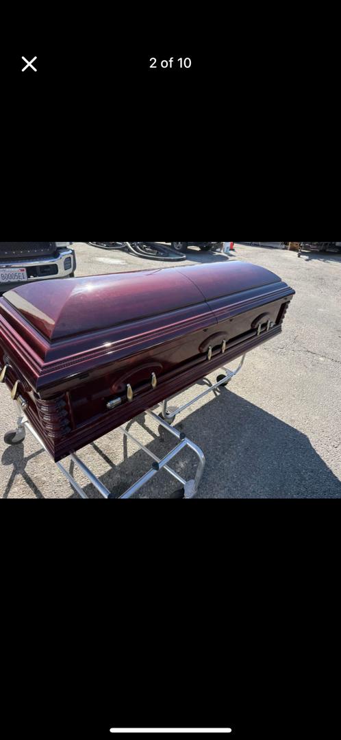 Burgundy Dome Casket — Foreign Caskets available at Vanity Funeral Home, Lagos