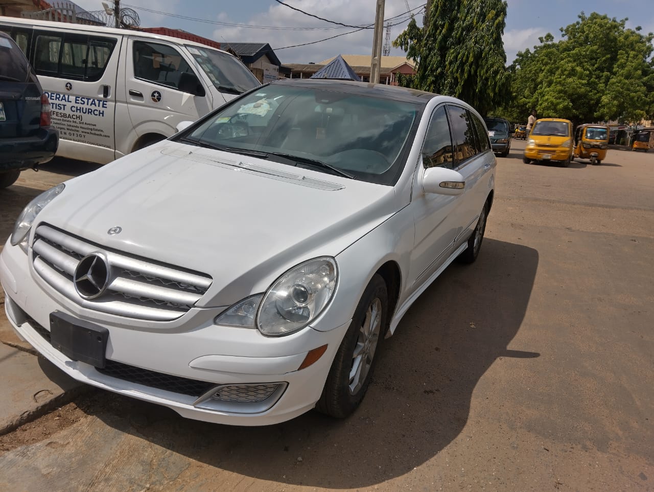 White Mercedes family car in the Vanity Funeral Home fleet